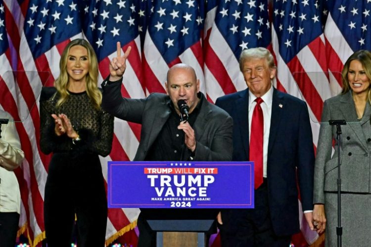 CEO of Ultimate Fighting Championship Dana White (C) is a close ally of US President-elect Donald Trump, even speaking at his election night victory rally. ©AFP