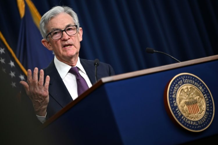 US President Donald Trump has criticized Fed chair Jerome Powell, seen in December 2024, recently suggesting that he knew more about interest rates than Fed officials. ©AFP