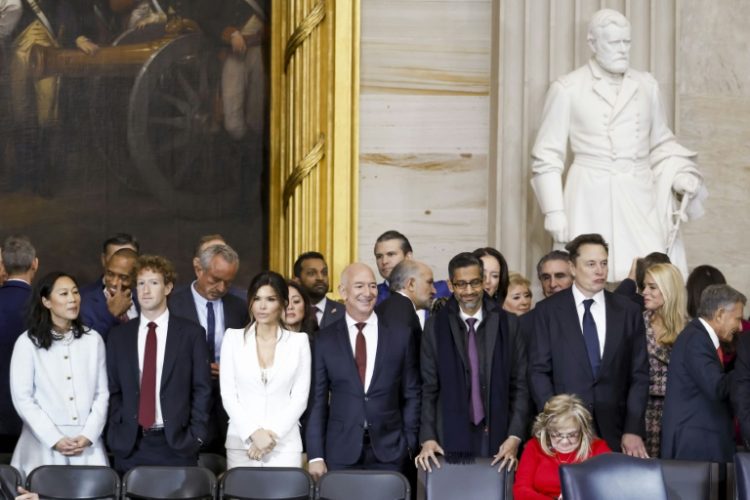 Priscilla Chan, Meta CEO Mark Zuckerberg, Lauren Sanchez,  Jeff Bezos, Alphabet’s CEO Sundar Pichai, and businessman Elon Musk, attend the inauguration ceremony of US President-elect Donald Trump in the US Capitol Rotunda in Washington, DC. ©AFP