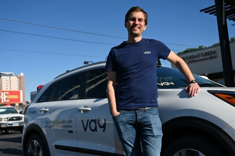 Thomas von der Ohe, CEO and Co-Founder of Vay Technology, stands for a portrait with a remote driving Kia. Over the last year, riders in Las Vegas have been able to test drive the vehicle . ©AFP