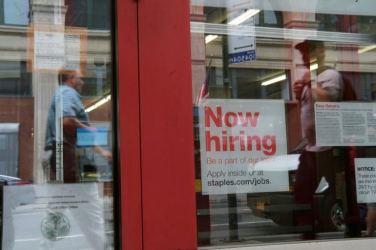 US hiring surged past expectations in December while unemployment dipped, according to government figures. ©AFP