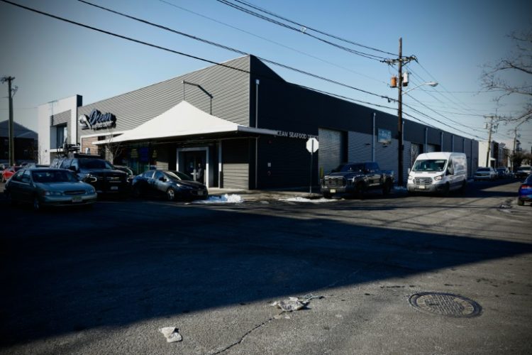 Newark Mayor Ras Baraka said a US Army veteran was among those detained in an overnight raid by immigration officers on Ocean Seafood Depot. ©AFP