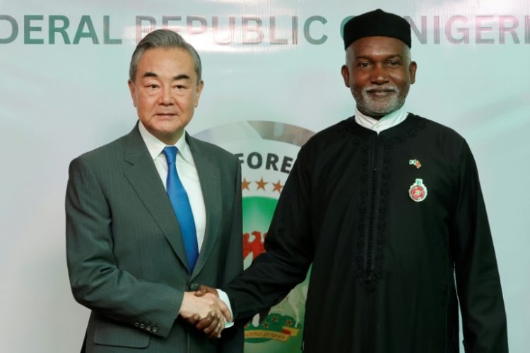 Chinese Foreign Minister Wang Yi held talks with Nigerian counterpart Yusuf Tuggar . ©AFP