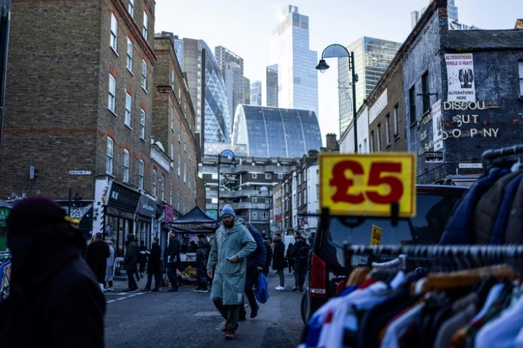 Britons remain hampered by high interest rates and elevated energy bills despite the annual inflation rate retreating from a four-decade peak of above 11 percent in October 2022. ©AFP