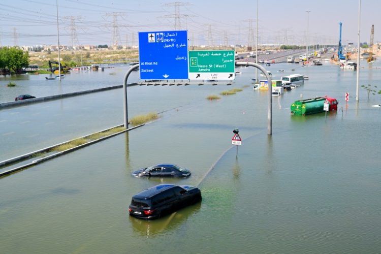 The record number of passengers travelling through Dubai international airport last year came despite unprecedented floods which disrupted operations last April.. ©AFP