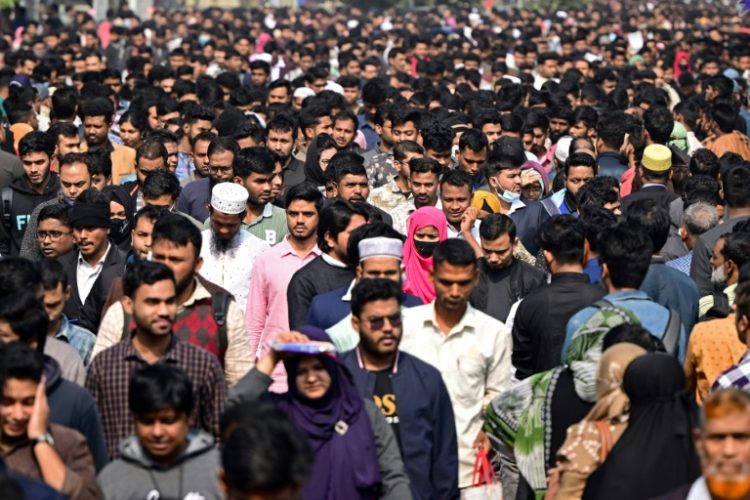 Job applicants leave an exam center after a written test in Dhaka. Some who helped overthrow the government say finding a job is harder than manning the barricades. ©AFP