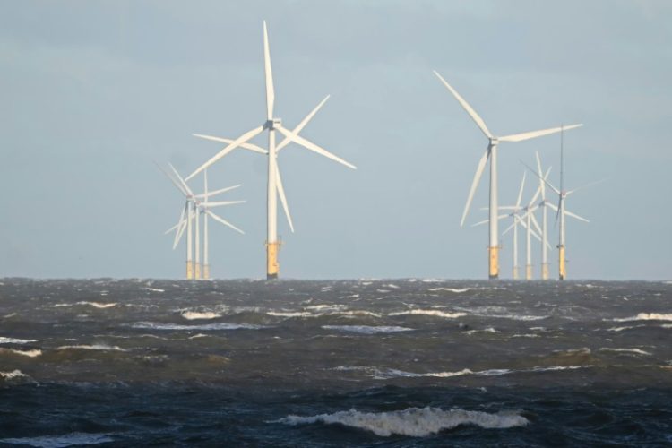 Turbines like these off the north coast of Wales are expected to help wind power become UK’s single-largest source of electricity in 2025. ©AFP