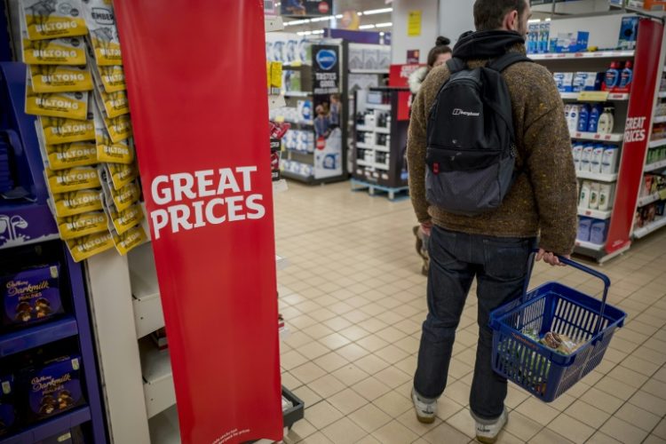 Official figures showed an unexpected dip to UK annual inflation, easing some pressure on the Labour government. ©AFP