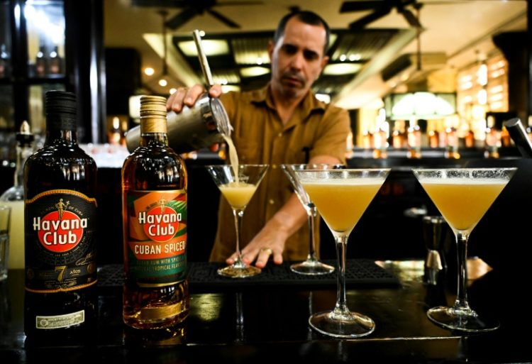 A bartender prepares a cocktail with the new Havana Club Cuban Spiced rum at Havana's rum museum in 2022. ©AFP