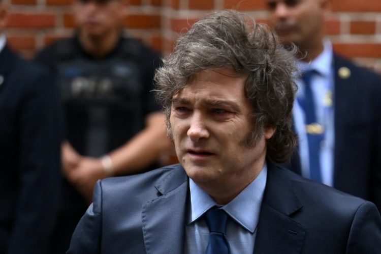 Argentina's President Javier Milei faced criticism after promoting a cryptocurrency whose value soared and then fell sharply. ©AFP