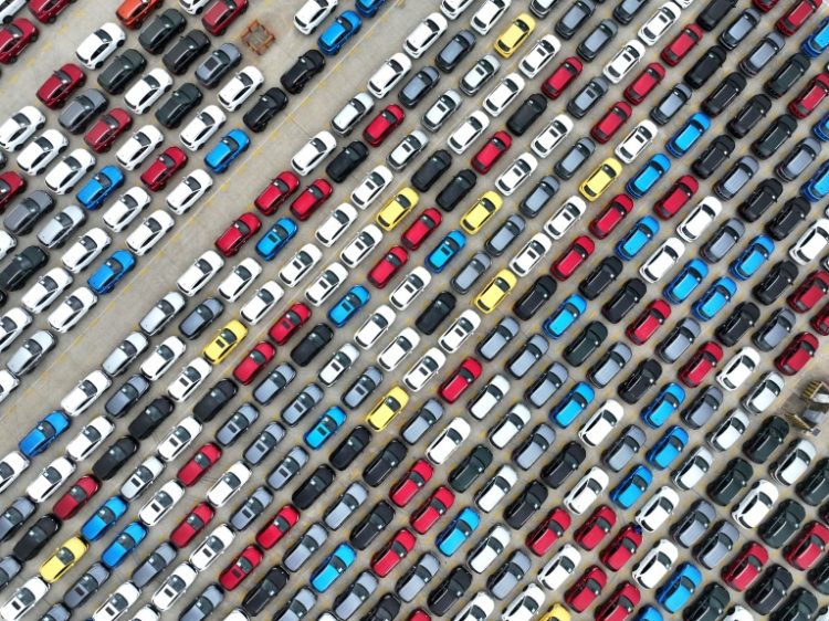 Cars waiting to be exported from a port in Lianyungang in east China's Jiangsu province. ©AFP