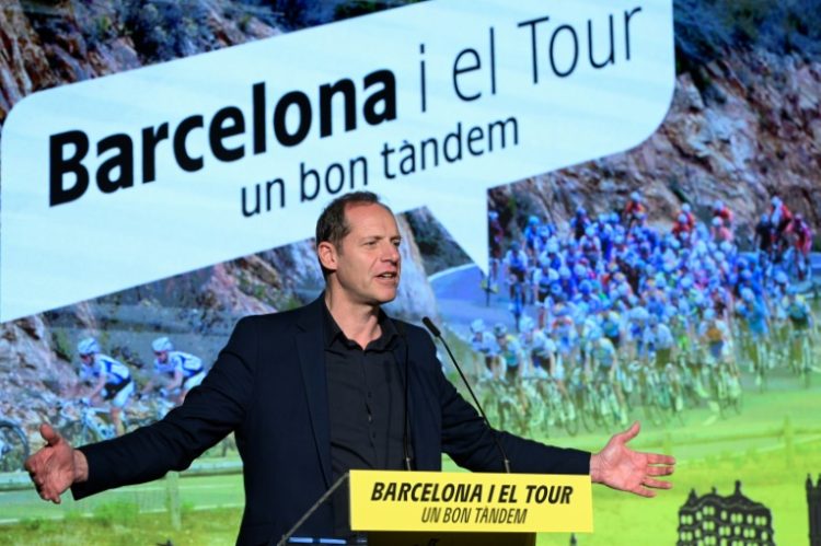 Chance to shine: Tour de France chief Christian Prudhomme unveiling the opening stages of the 2026 race in Barcelona. ©AFP