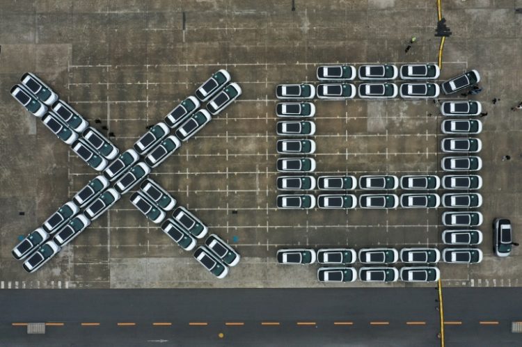 X9 electric vehicles by Chinese EV manufacturer XPeng, waiting to be loaded on a ship headed  for Thailand. ©AFP