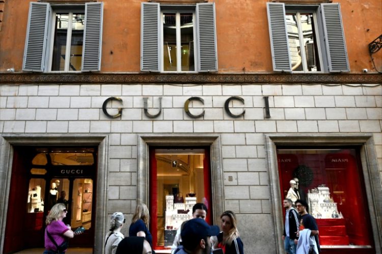 Despite a drop in earnings, shares in Gucci's parent company jumped as the results were not as bad as feared. ©AFP