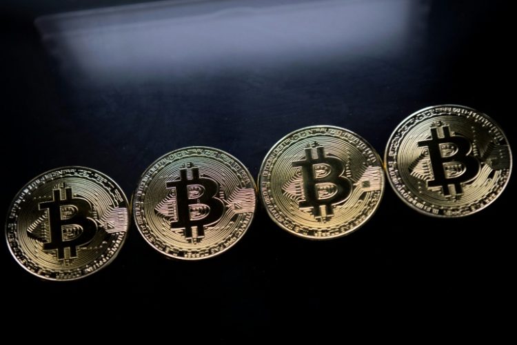 Recent market volatility and economic worries have dealt a blow to the crypto universe. ©AFP