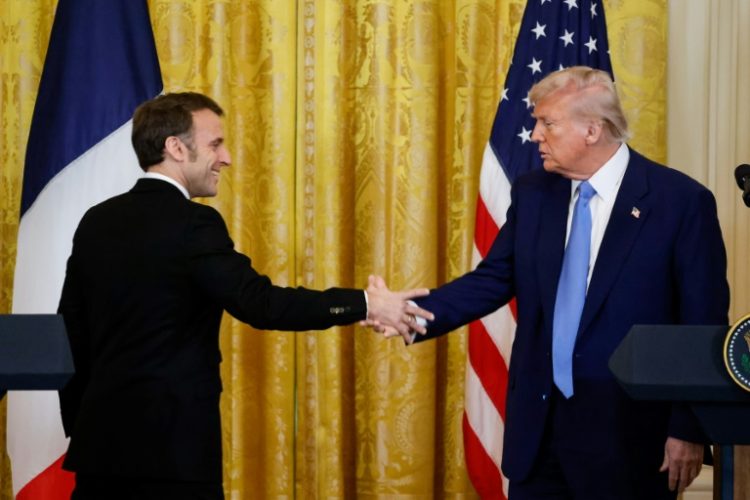 US President Donald Trump said tariffs he has unveiled on Canada and Mexico are going ahead as planned, in a press conference after talks with French President Emmanuel Macron. ©AFP