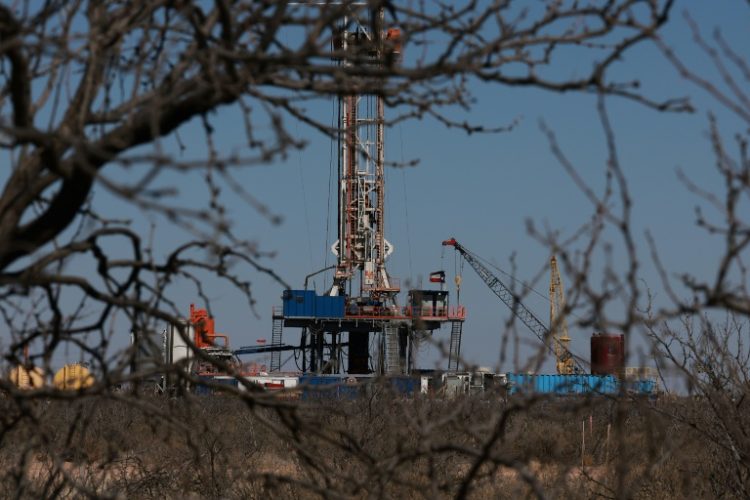 Industry experts are skeptical that oil companies will significantly ramp up drilling in spite of Donald Trump's calls for more production. ©AFP