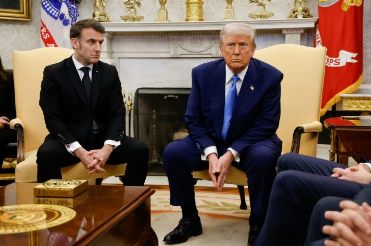 French President Emmanuel Macron said alongside Trump that he opposes the move. ©AFP