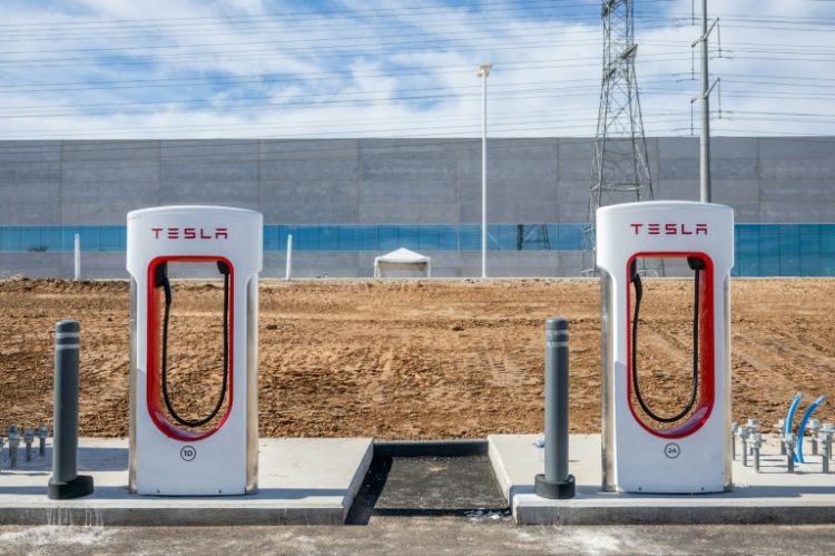 Charging stations are seen at the Tesla corporate headquarters in Travis County, Texas. ©AFP