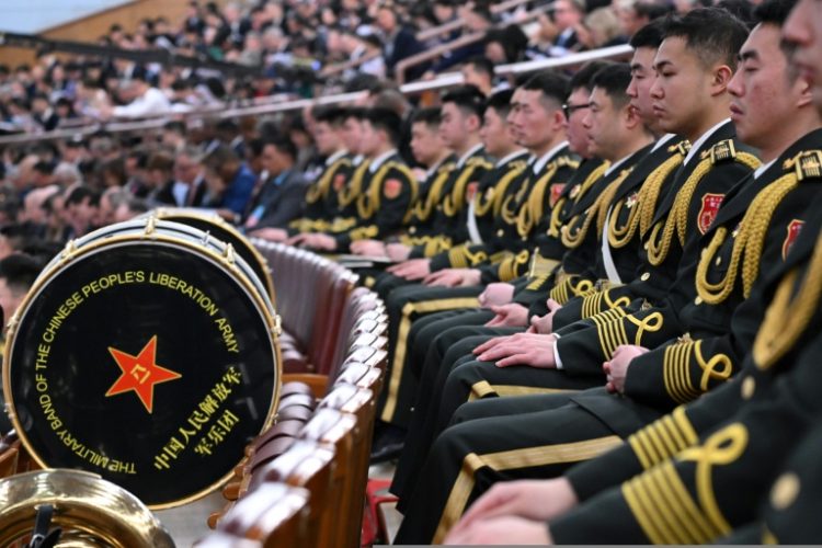 The People’s Liberation Army (PLA) band members  in Beijing on Wednesday: China has the world's second-largest military budget, but lags well behind the United States, its primary strategic rival. ©AFP